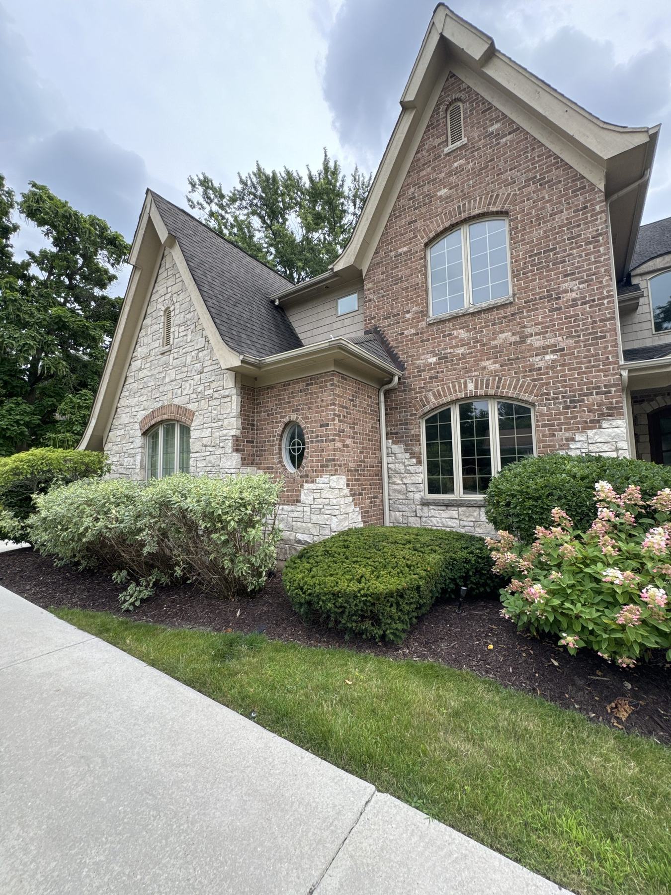 House exterior with brown fascia and trim repainted